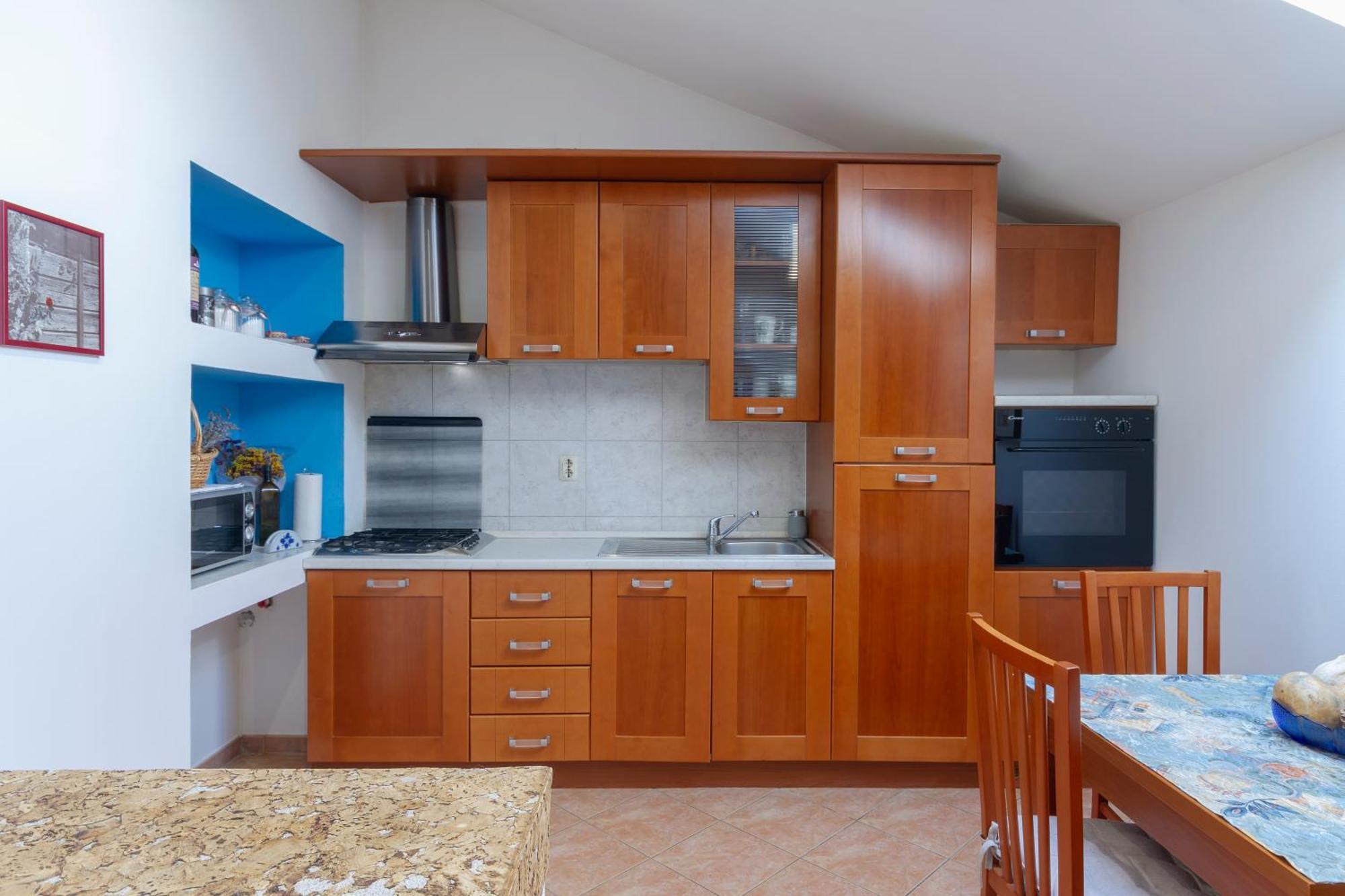 Amu Apartment Pula Bagian luar foto