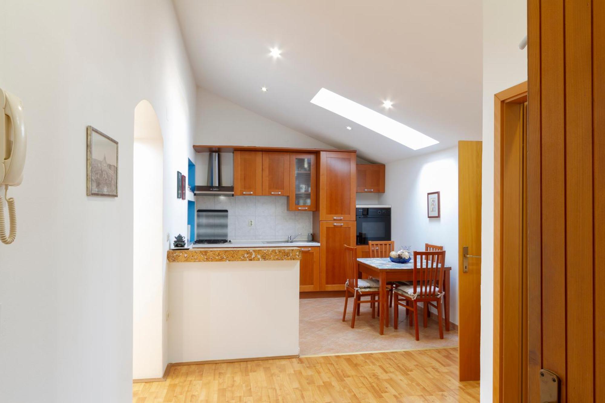 Amu Apartment Pula Bagian luar foto