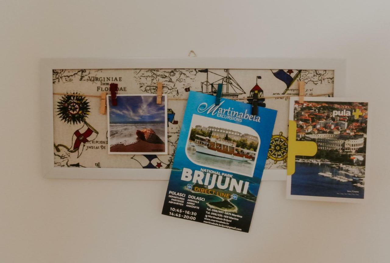 Amu Apartment Pula Bagian luar foto